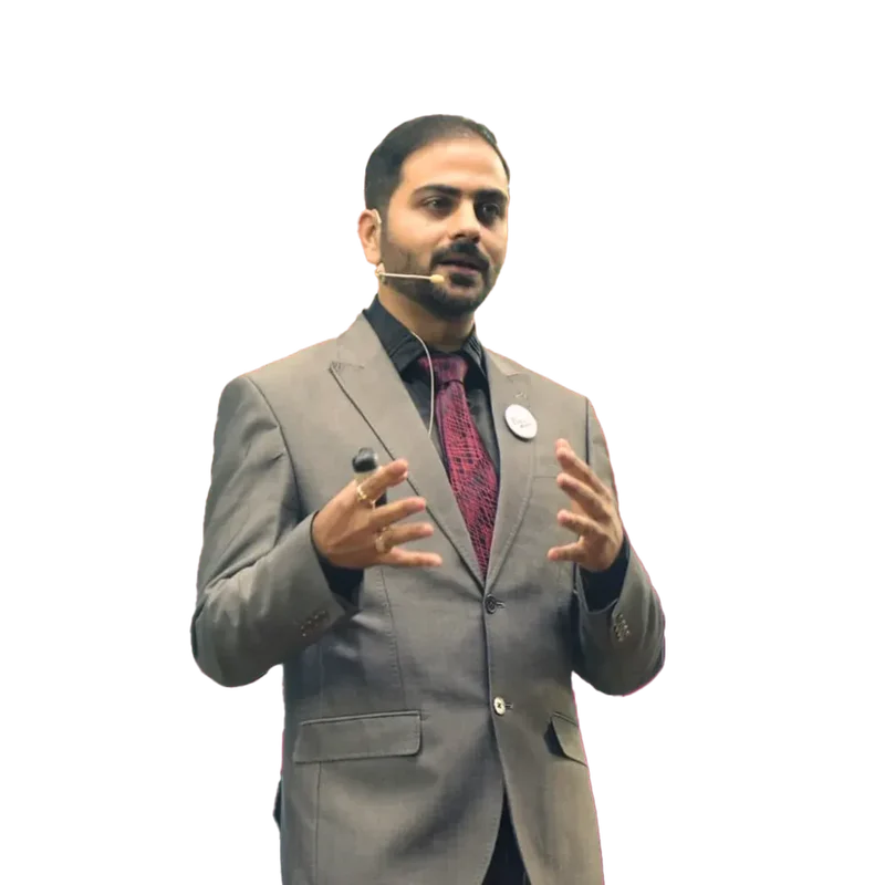 Abhishek Jain speaking on stage.